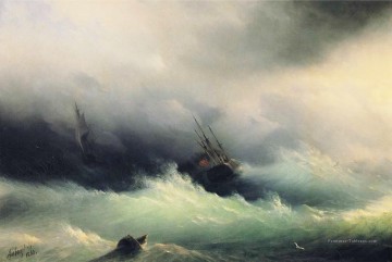  vagues peintre - Ivan Aivazovsky débarque dans une tempête 1860 Vagues de l’océan